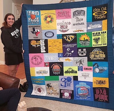 She loves her Too Cool T-shirt quilt