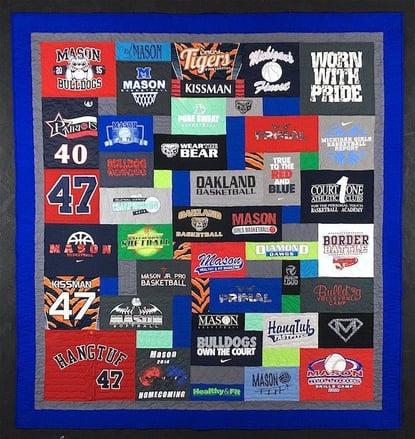 T-shirt quilt with a border by Too Cool T-shirt Quilts