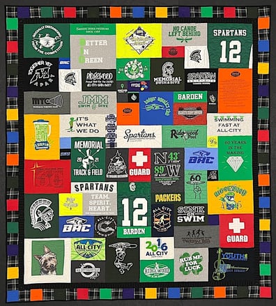 T-shirt quilt with a border by Too Cool T-shirt Quilts