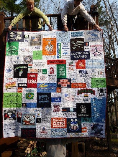 Hang a T-shirt quilt over the deck for a photo