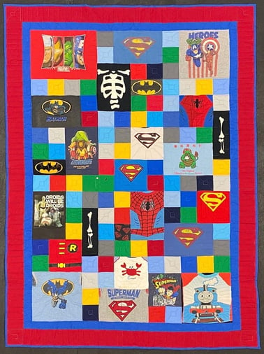 T-shirt quilt with a border by Too Cool T-shirt Quilts